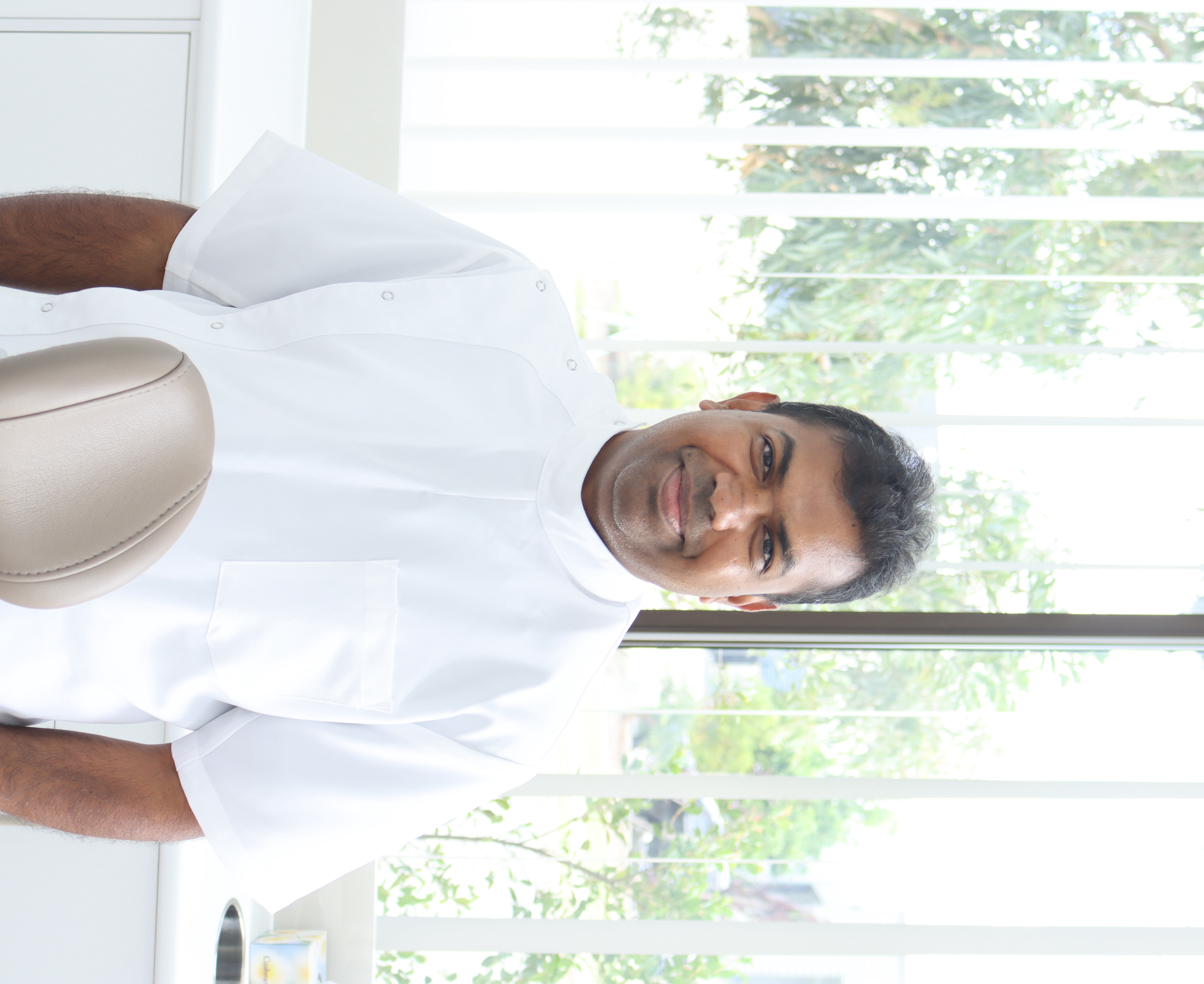 Dr. Arun Arunasalam - Experienced Dentist